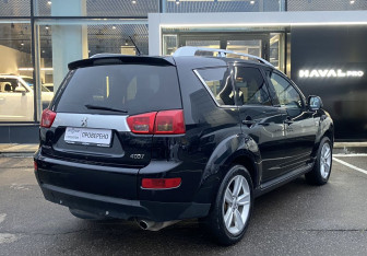 Подержанный автомобиль Peugeot 4007 2011 года (5 фото)