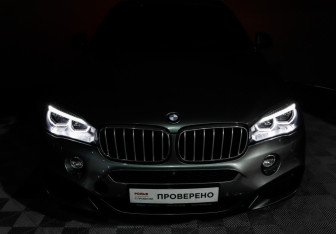 Подержанный автомобиль BMW X6 2016 года (20 фото)