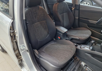 Подержанный автомобиль Kia Rio Sedan 2012 года (18 фото)