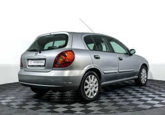 Подержанный автомобиль Nissan Almera Hatchback 2006 года (5 фото)