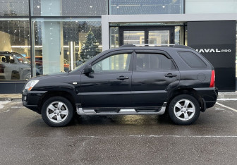 Подержанный автомобиль Kia Sportage 2009 года (8 фото)