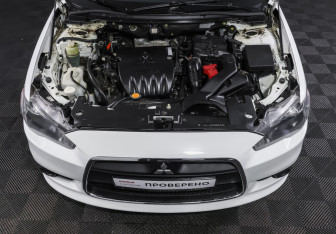 Подержанный автомобиль Mitsubishi Lancer Sedan 2012 года (9 фото)