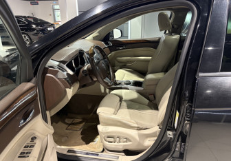Подержанный автомобиль Cadillac SRX 2011 года (7 фото)