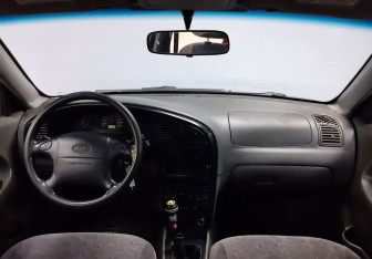 Подержанный автомобиль Kia Spectra Sedan 2007 года (12 фото)