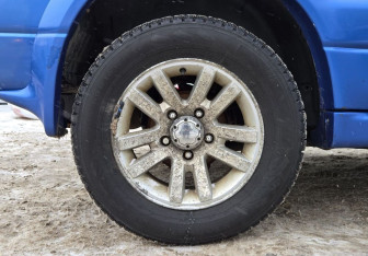 Подержанный автомобиль Suzuki Grand Vitara 2003 года (13 фото)