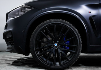 Подержанный автомобиль BMW X6 2016 года (15 фото)