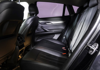 Подержанный автомобиль BMW X6 2015 года (11 фото)