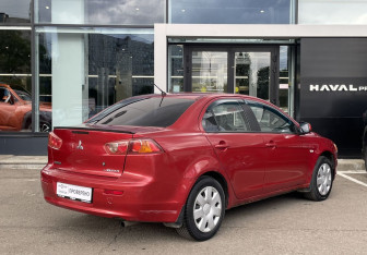 Подержанный автомобиль Mitsubishi Lancer Sedan 2008 года (5 фото)