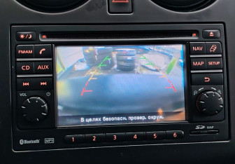 Подержанный автомобиль Nissan Qashqai+2 2011 года (15 фото)