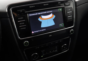 Подержанный автомобиль Skoda Superb Liftback 2012 года (13 фото)