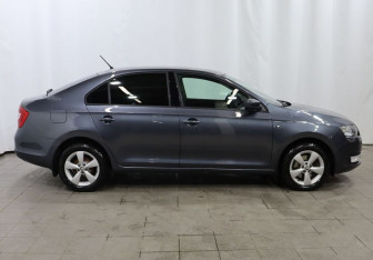 Подержанный автомобиль Skoda Rapid Liftback 2014 года (7 фото)
