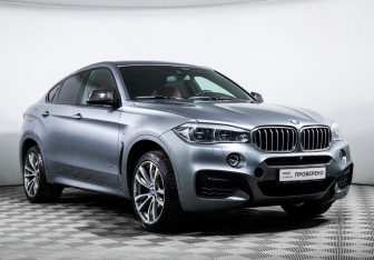 Подержанный автомобиль BMW X6 2016 года (3 фото)