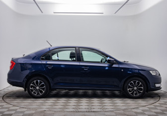 Подержанный автомобиль Skoda Rapid Liftback 2014 года (4 фото)