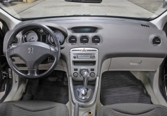 Подержанный автомобиль Peugeot 308 Wagon 2008 года (16 фото)