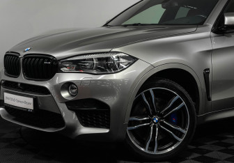 Подержанный автомобиль BMW X6 M 2015 года (23 фото)