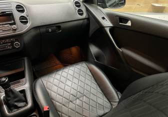 Подержанный автомобиль Volkswagen Tiguan 2014 года (16 фото)