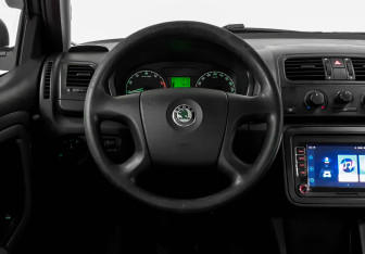 Подержанный автомобиль Skoda Fabia Hatchback 2009 года (11 фото)