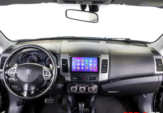 Подержанный автомобиль Peugeot 4007 2011 года (8 фото)