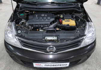 Подержанный автомобиль Nissan Tiida Sedan 2011 года (9 фото)
