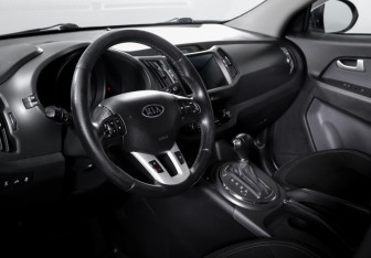 Подержанный автомобиль Kia Sportage 2011 года (14 фото)