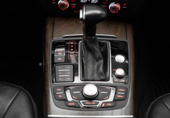 Подержанный автомобиль Audi A6 allroad 2014 года (21 фото)