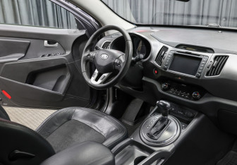 Подержанный автомобиль Kia Sportage 2012 года (10 фото)