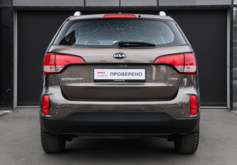 Подержанный автомобиль Kia Sorento 2013 года (5 фото)