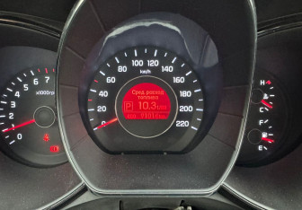 Подержанный автомобиль Kia Rio Sedan 2015 года (12 фото)