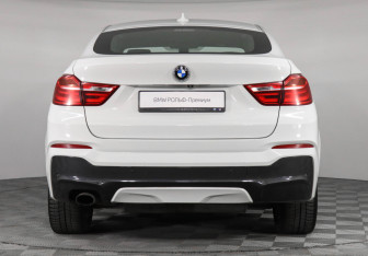Подержанный автомобиль BMW X4 2016 года (4 фото)