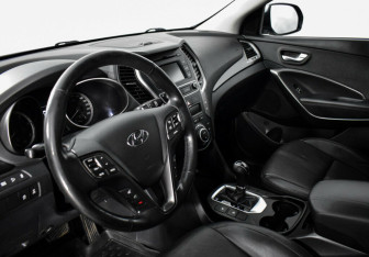 Подержанный автомобиль Hyundai Santa Fe 2016 года (7 фото)