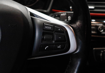 Подержанный автомобиль BMW X1 2016 года (21 фото)