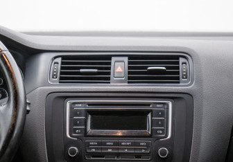 Подержанный автомобиль Volkswagen Jetta Sedan 2014 года (14 фото)