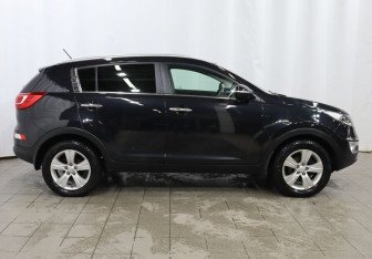 Подержанный автомобиль Kia Sportage 2012 года (7 фото)