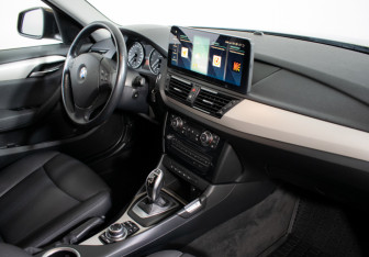 Подержанный автомобиль BMW X1 2014 года (9 фото)