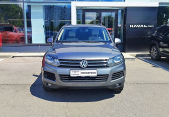 Подержанный автомобиль Volkswagen Touareg 2014 года (2 фото)