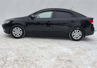 Подержанный автомобиль Kia Cerato Sedan 2012 года (8 фото)