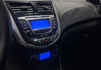 Подержанный автомобиль Hyundai Solaris Sedan 2011 года (14 фото)