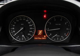 Подержанный автомобиль BMW X1 2013 года (13 фото)