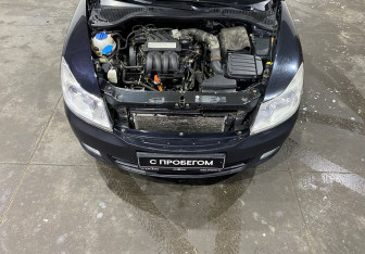 Подержанный автомобиль Skoda Octavia Liftback 2011 года (14 фото)