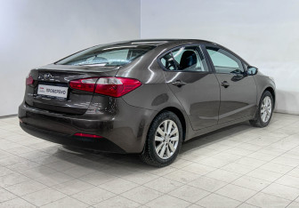 Подержанный автомобиль Kia Cerato Sedan 2013 года (4 фото)