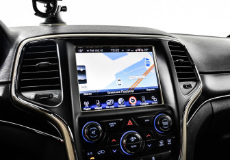 Подержанный автомобиль Jeep Grand Cherokee 2013 года (25 фото)