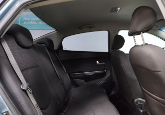 Подержанный автомобиль Kia Rio Sedan 2015 года (11 фото)