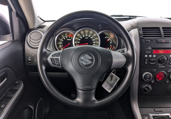 Подержанный автомобиль Suzuki Grand Vitara 2014 года (21 фото)