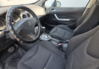 Подержанный автомобиль Peugeot 308 Hatchback 2010 года (9 фото)