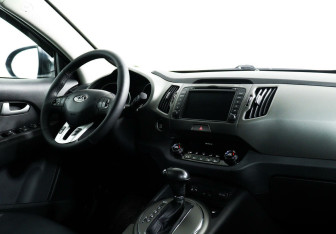 Подержанный автомобиль Kia Sportage 2014 года (9 фото)