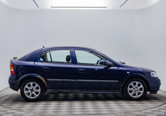 Подержанный автомобиль Opel Astra Hatchback 2001 года (6 фото)