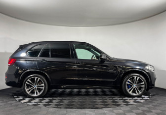 Подержанный автомобиль BMW X5 2014 года (6 фото)