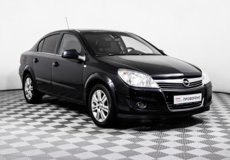 Подержанный автомобиль Opel Astra Sedan 2011 года (3 фото)