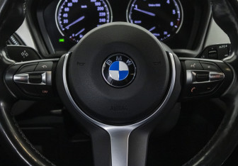 Подержанный автомобиль BMW X1 2018 года (12 фото)