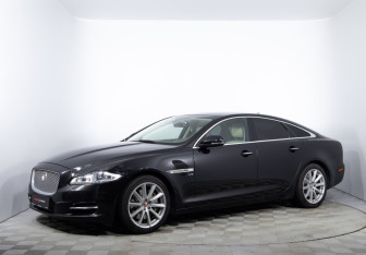 Подержанный автомобиль Jaguar XJ 2014 года (1 фото)